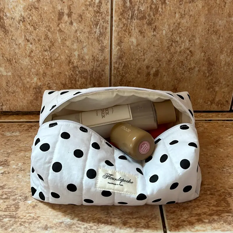 White polka dot makeup bag